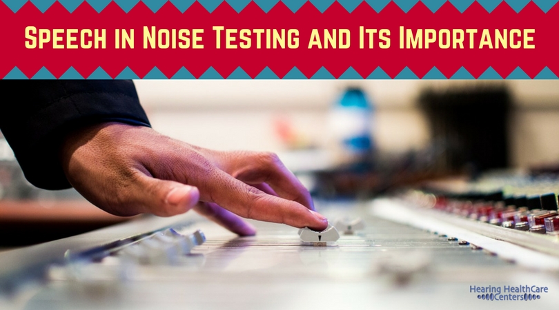 hand on audio controls during a hearing test